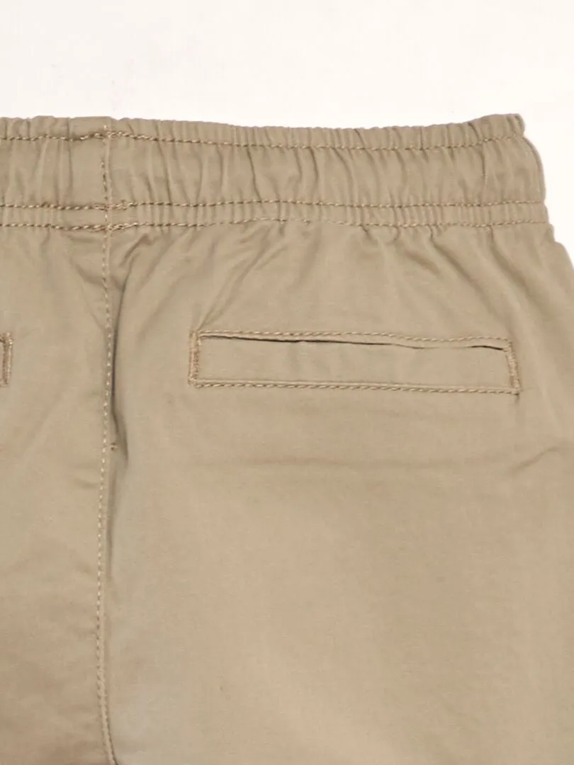 PANTALóN CON MúLTIPLES BOLSILLOS  BEIGE