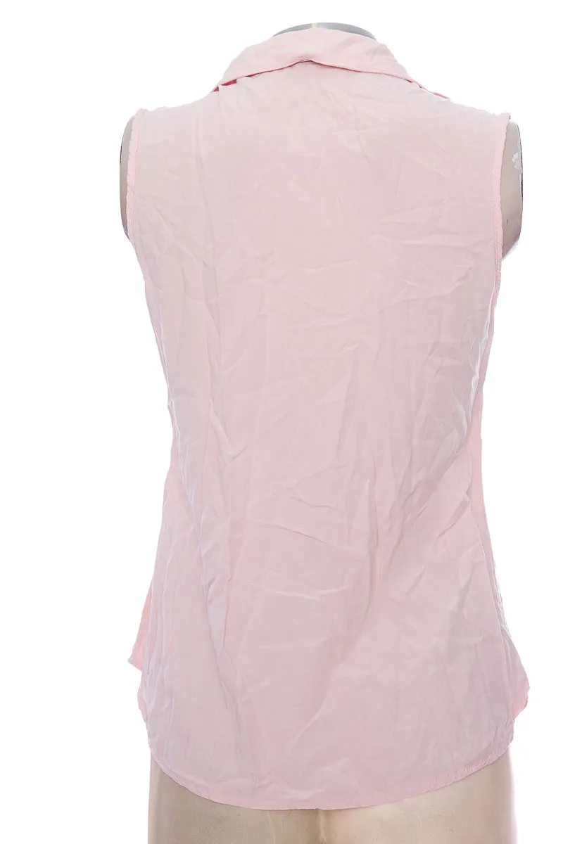 TOP / CAMISETA COLOR ROSADO  CLOSEANDO